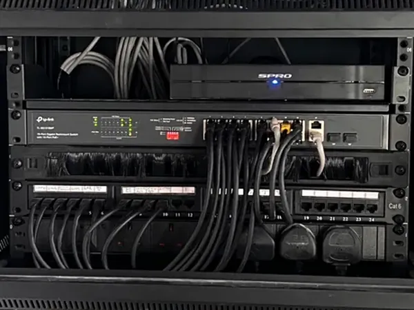 Network cabinet containing Ethernet switches, patch panels and CCTV recording equipment